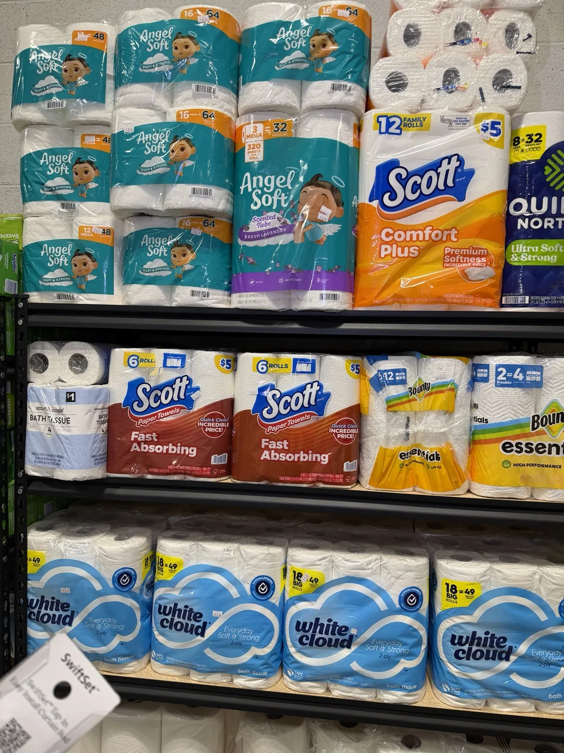 Paper towels and toilet tissue on store shelves