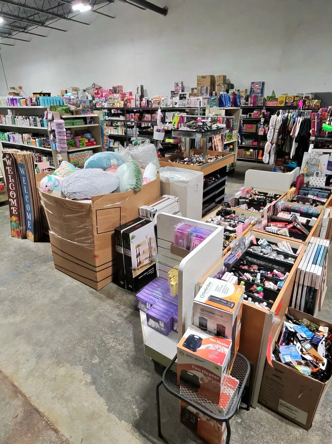 Inside 346 Unlimited Bargins store with aisles and merchandise